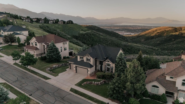 1628 E Lone Oak Dr, Draper, UT 84020 - aerial view of property and surrounding area with a mountainous background and nearby suburban area