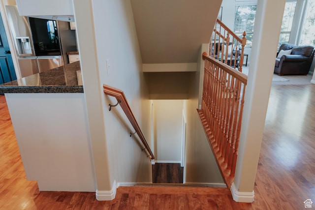 1628 E Lone Oak Dr, Draper, UT 84020 - stairs featuring wood finished floors and baseboards