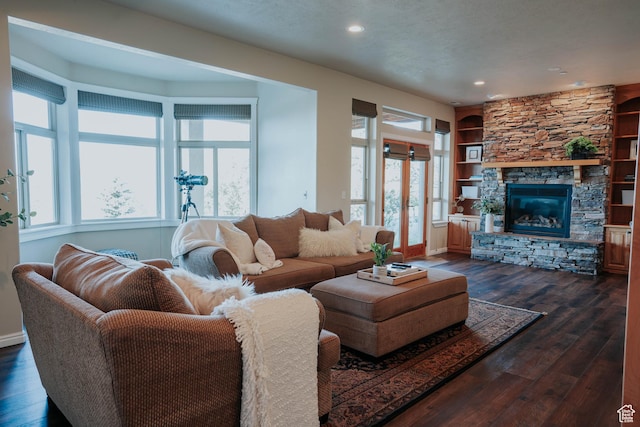 1628 E Lone Oak Dr, Draper, UT 84020 - living area with dark wood finished floors, a stone fireplace, and recessed lighting