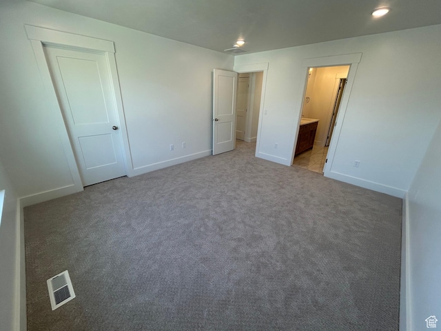 556 N 800 W, Smithfield, UT 84335 - unfurnished bedroom with light colored carpet and ensuite bath