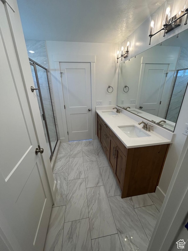 556 N 800 W, Smithfield, UT 84335 - bathroom with marble finish floors, a stall shower, double vanity, and a chandelier