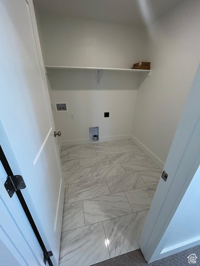 556 N 800 W, Smithfield, UT 84335 - laundry area with hookup for a washing machine, light marble finish flooring, and electric dryer hookup