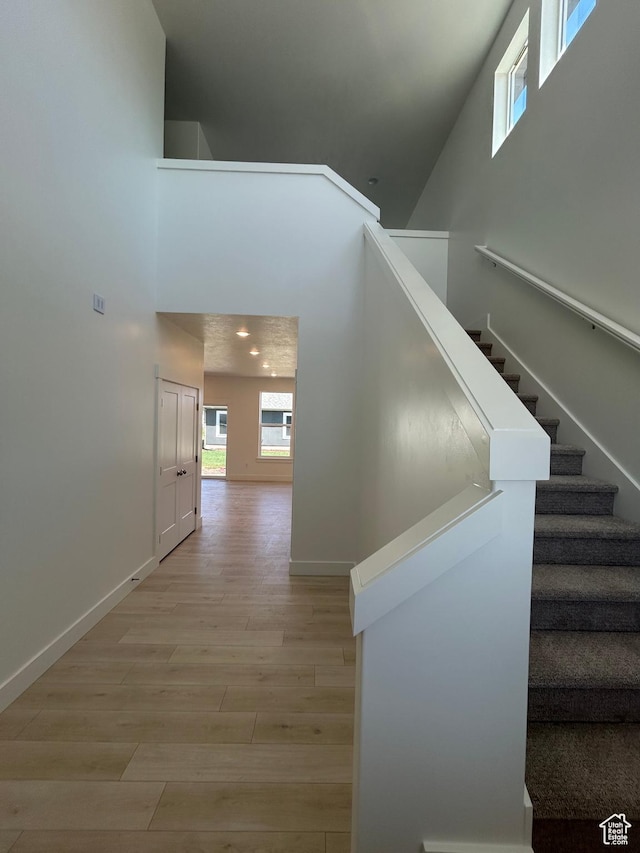 556 N 800 W, Smithfield, UT 84335 - stairway featuring a high ceiling and wood finished floors