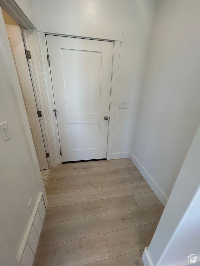 556 N 800 W, Smithfield, UT 84335 - corridor with light wood-style flooring and baseboards