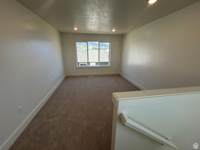 556 N 800 W, Smithfield, UT 84335 - empty room with recessed lighting, carpet, and a textured ceiling