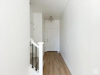 1805 N 70 W, Tooele, UT 84074 - corridor featuring light wood-style floors and baseboards
