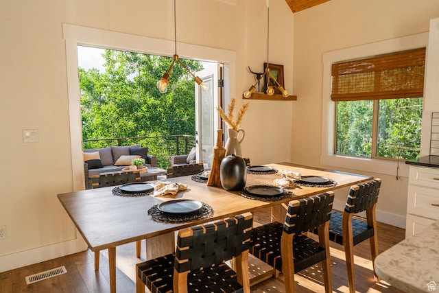 2143 S Aspen Cir, Wanship, UT 84017 - dining space featuring wood finished floors and plenty of natural light
