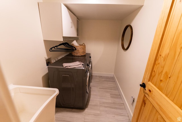 2143 S Aspen Cir, Wanship, UT 84017 - washroom featuring washing machine and clothes dryer and cabinet space