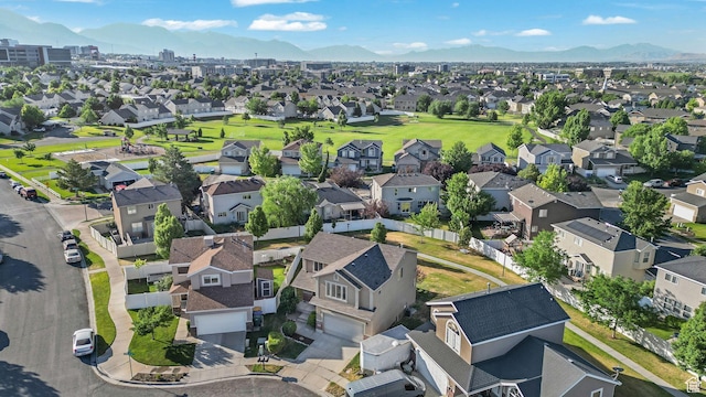 4004 N Shelter Cv W, Lehi, UT 84043 - aerial perspective of suburban area featuring a mountainous background