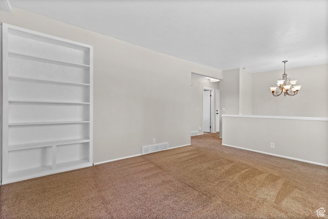2124 W 7125 S, West Jordan, UT 84084 - spare room with carpet, a chandelier, and built in features