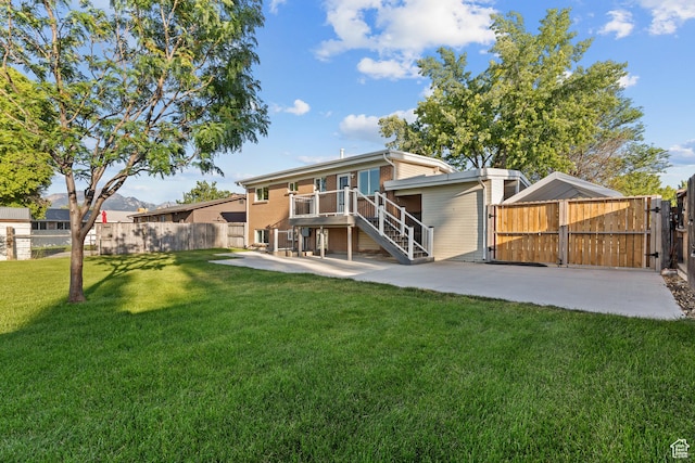 2124 W 7125 S, West Jordan, UT 84084 - back of property with a patio, a gate, and stairs
