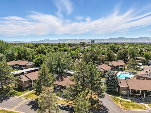 4742 S 700 E Unit 84, Salt Lake City, UT 84107 - drone / aerial view of a mountain backdrop and a pool