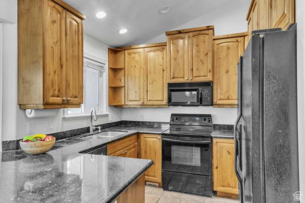1342 S 1340 E, Spanish Fork, UT 84660 - kitchen featuring black appliances, open shelves, lofted ceiling, dark stone counters, and light tile patterned floors