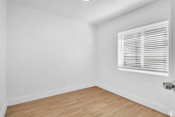 1342 S 1340 E, Spanish Fork, UT 84660 - unfurnished room featuring baseboards and light wood-style floors