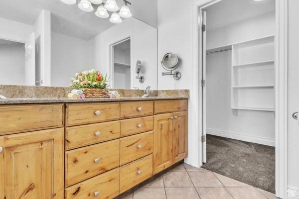 1342 S 1340 E, Spanish Fork, UT 84660 - full bath with double vanity, tile patterned flooring, and a spacious closet