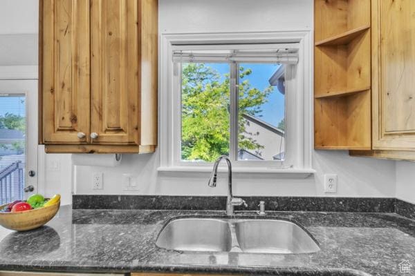 1342 S 1340 E, Spanish Fork, UT 84660 - kitchen featuring dark stone counters and brown cabinets