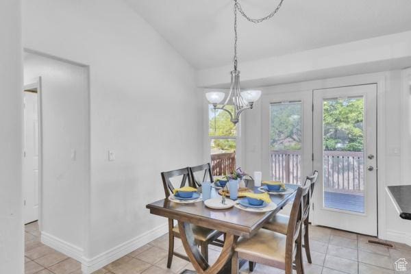 1342 S 1340 E, Spanish Fork, UT 84660 - dining room with lofted ceiling, plenty of natural light, light tile patterned floors, and a chandelier