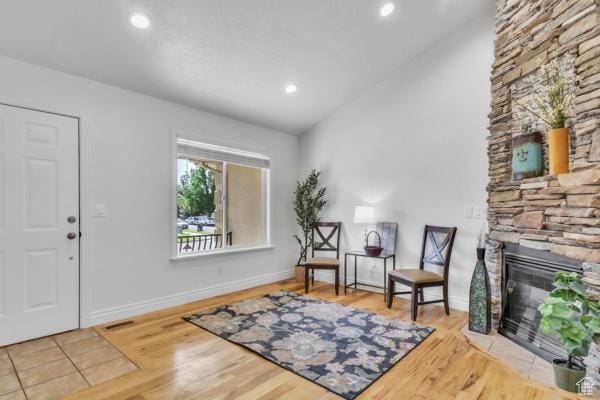 1342 S 1340 E, Spanish Fork, UT 84660 - entryway with a stone fireplace, wood finished floors, recessed lighting, and lofted ceiling