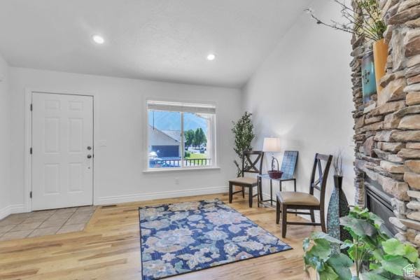 1342 S 1340 E, Spanish Fork, UT 84660 - entryway featuring a stone fireplace, wood finished floors, lofted ceiling, and recessed lighting