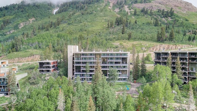 9202 E Lodge Dr Unit 201202, Snowbird, UT 84092 - view of apartment building / complex with a forest view