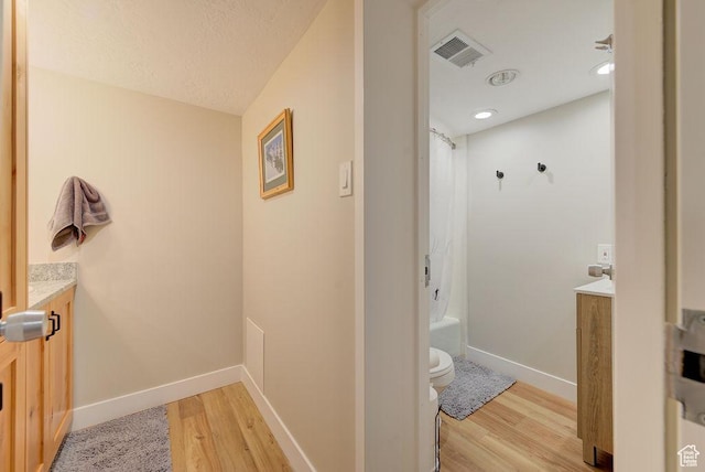 9202 E Lodge Dr Unit 201202, Snowbird, UT 84092 - bathroom featuring vanity, wood finished floors, and shower / tub combo