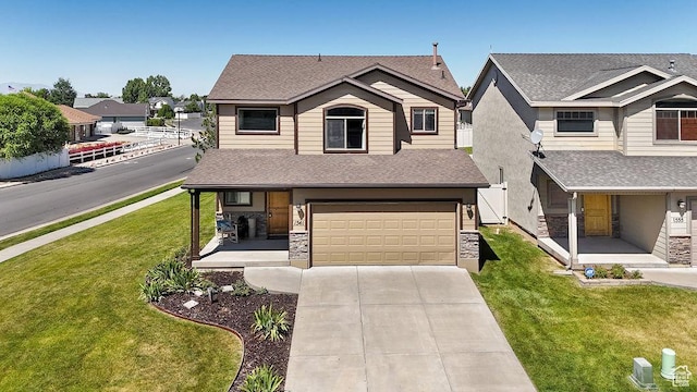1541 N 25 E, Layton, UT 84041 - view of front of property featuring a porch, a shingled roof, concrete driveway, a garage, and a front yard