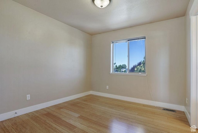 1541 N 25 E, Layton, UT 84041 - unfurnished room with baseboards and light wood finished floors