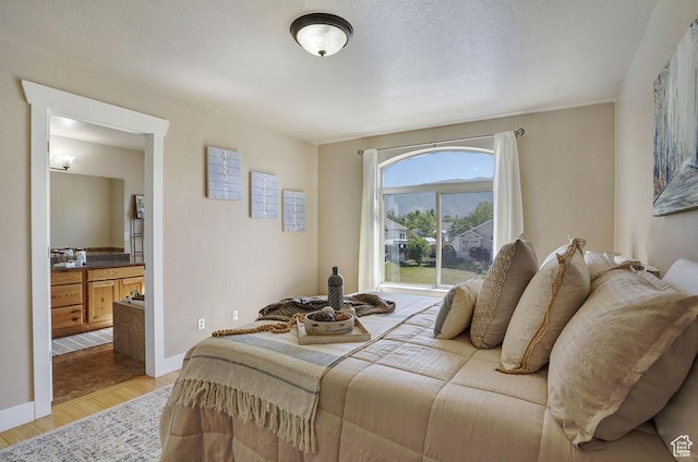 1541 N 25 E, Layton, UT 84041 - bedroom with light wood-style floors and baseboards