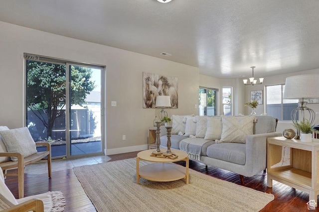 1541 N 25 E, Layton, UT 84041 - living room featuring hardwood / wood-style flooring and a chandelier