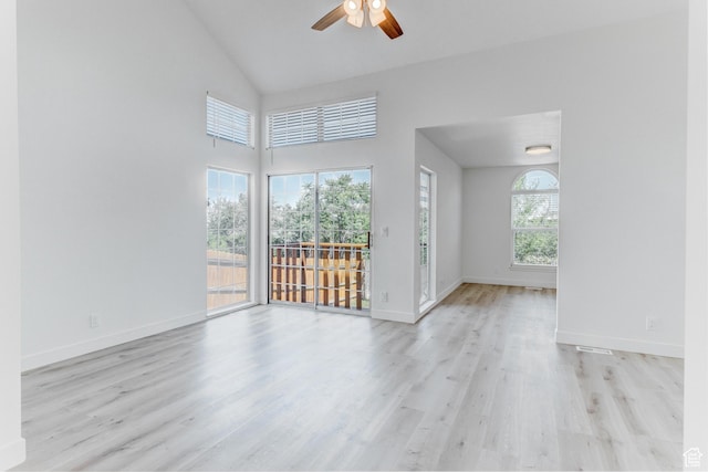 415 E Acoma Rd S, Midvale, UT 84047 - spare room featuring a ceiling fan, wood finished floors, and high vaulted ceiling