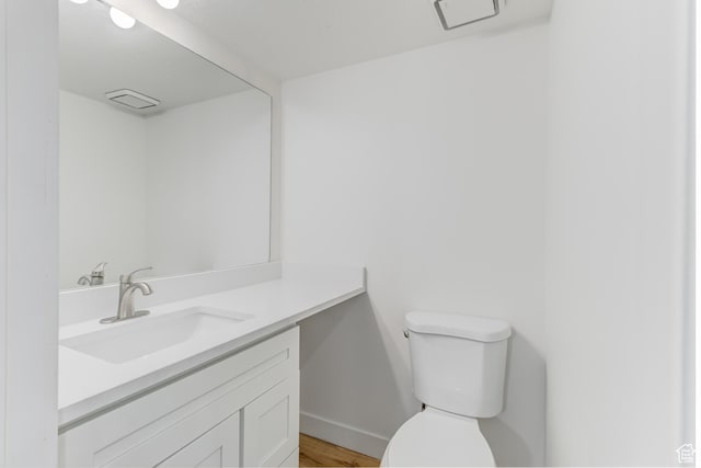 415 E Acoma Rd S, Midvale, UT 84047 - half bathroom featuring vanity and wood finished floors