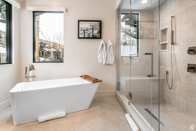 552 Deer Valley Dr, Park City, UT 84060 - bathroom featuring a soaking tub, a stall shower, and tile patterned flooring