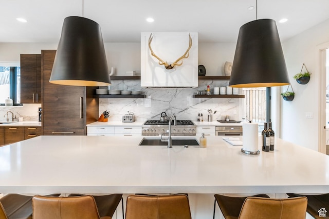 552 Deer Valley Dr, Park City, UT 84060 - kitchen with modern cabinets, open shelves, light countertops, tasteful backsplash, and recessed lighting