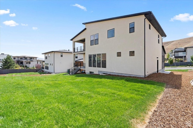5554 N Fox Canyon Rd, Lehi, UT 84043 - back of property featuring a balcony, stucco siding, and a residential view