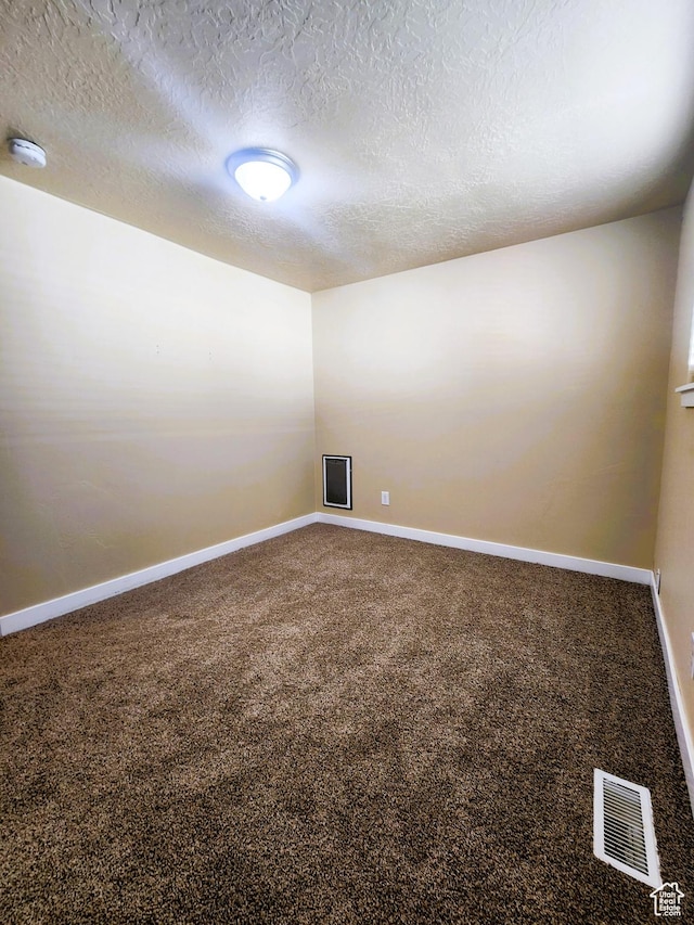 464 N Grant St, Salt Lake City, UT 84116 - carpeted spare room with a smoke detector and a textured ceiling
