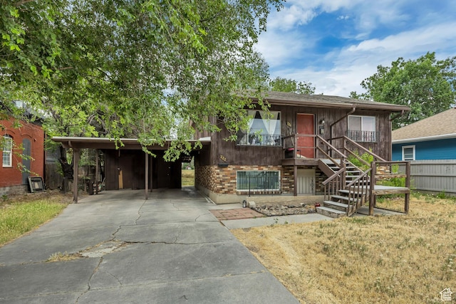 222 W Center St S, Midvale, UT 84047 - view of front facade featuring driveway and stairs
