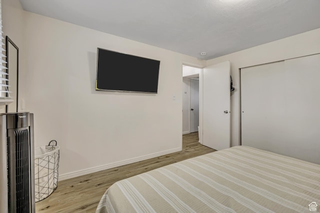 222 W Center St S, Midvale, UT 84047 - bedroom with wood finished floors and a closet