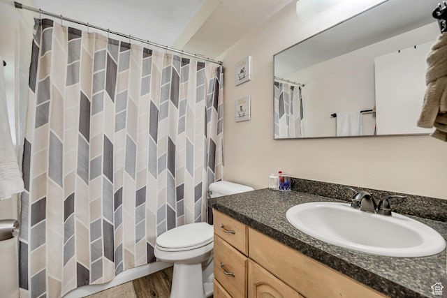 222 W Center St S, Midvale, UT 84047 - full bath featuring vanity, curtained shower, and wood finished floors