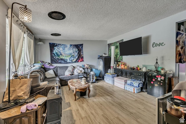 222 W Center St S, Midvale, UT 84047 - living room featuring a textured ceiling and wood finished floors