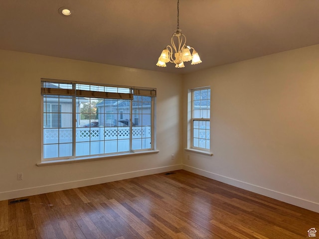 511 W 40 N, Orem, UT 84057 - spare room featuring a chandelier and wood finished floors