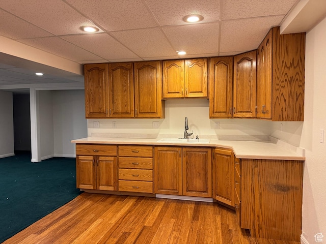 511 W 40 N, Orem, UT 84057 - kitchen with brown cabinets, recessed lighting, light countertops, dark wood-style floors, and a drop ceiling