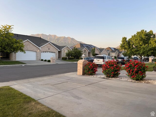 511 W 40 N, Orem, UT 84057 - view of yard with a residential view, a garage, and concrete driveway