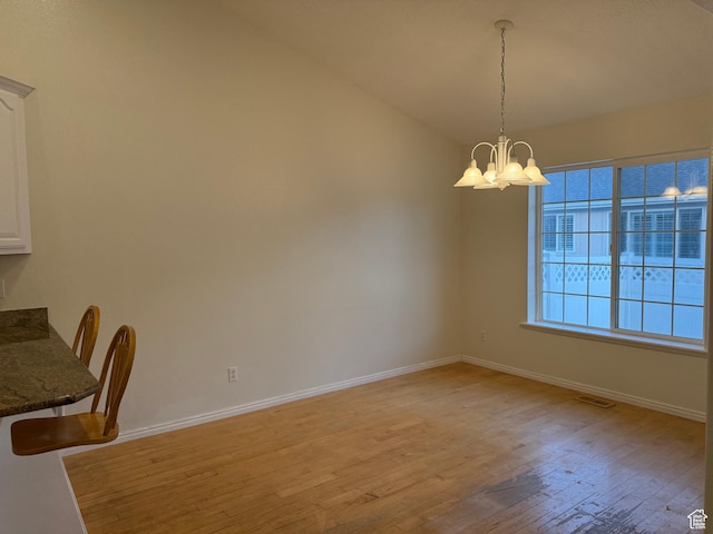 511 W 40 N, Orem, UT 84057 - unfurnished dining area with a chandelier and light wood finished floors
