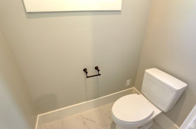 435 E Maple St, Mapleton, UT 84664 - bathroom featuring marble look tile flooring and toilet
