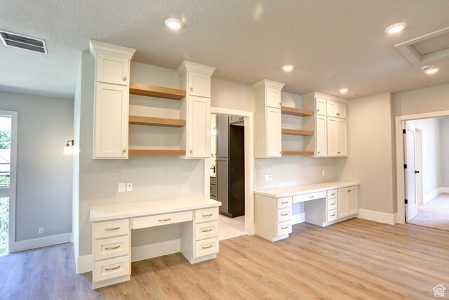 435 E Maple St, Mapleton, UT 84664 - kitchen featuring open shelves, built in desk, white cabinetry, light countertops, and recessed lighting