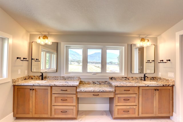 435 E Maple St, Mapleton, UT 84664 - full bathroom with vanity, marble finish floors, and a textured ceiling