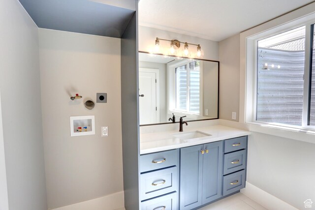 435 E Maple St, Mapleton, UT 84664 - bathroom with vanity and tile patterned floors