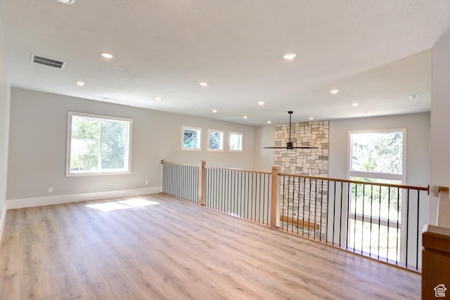 435 E Maple St, Mapleton, UT 84664 - empty room with wood finished floors and recessed lighting