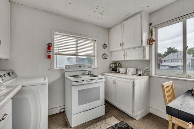 733 E Linden Ave, Salt Lake City, UT 84102 - kitchen with white range with electric stovetop, washing machine and dryer, white cabinetry, and light countertops