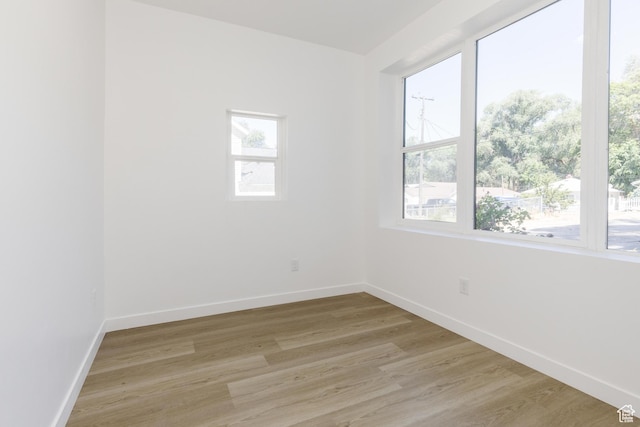 221 E 8th S, Ogden, UT 84401 - unfurnished room featuring light wood finished floors and baseboards